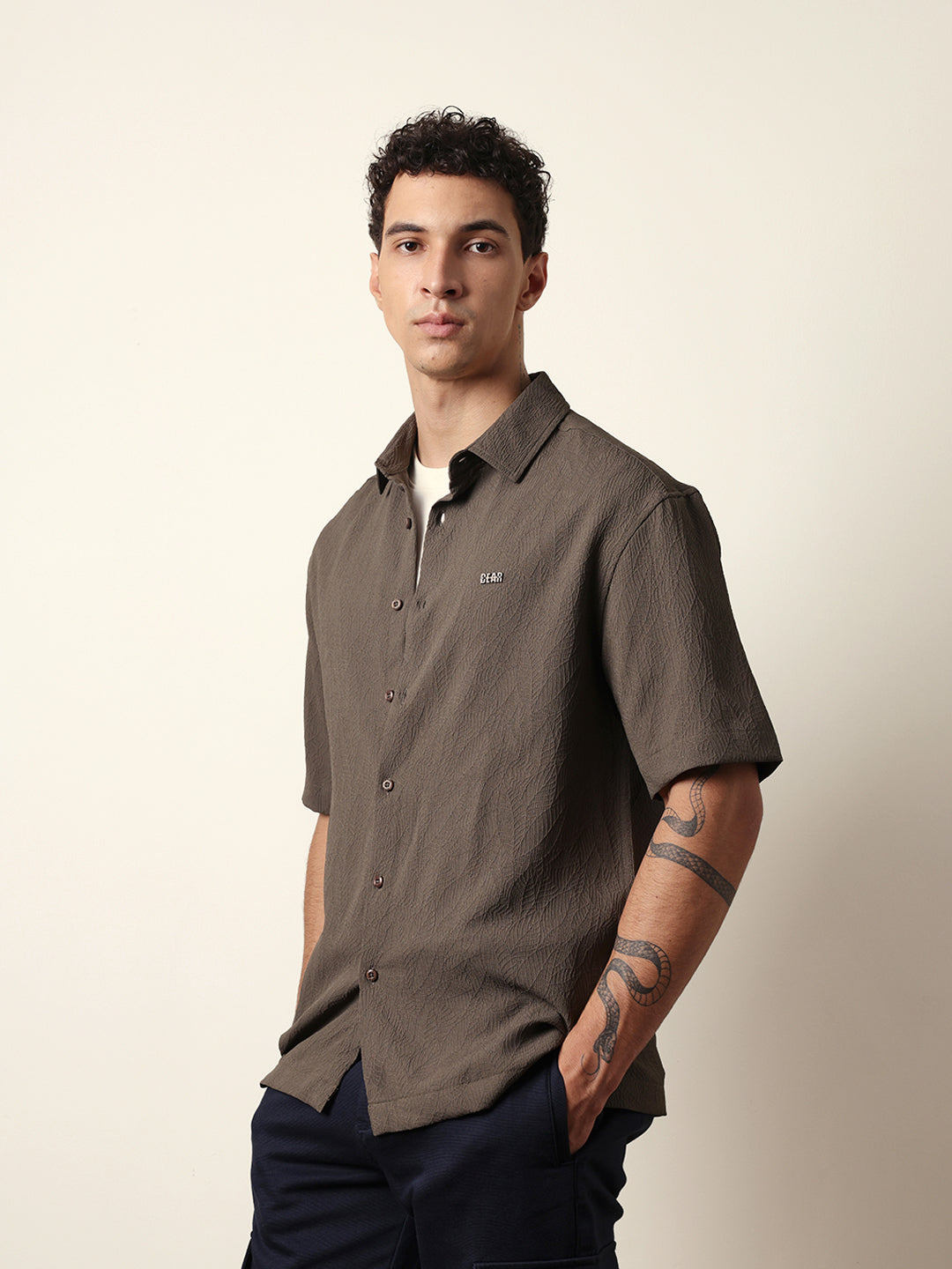 olive all over textured leaf motif oversized shirt with half sleeves olive all over textured leaf motif oversized shirt with half sleeves