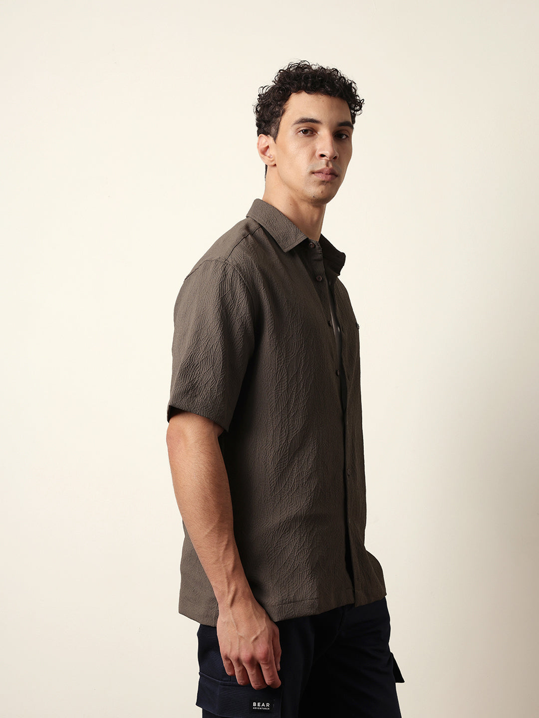 olive all over textured leaf motif oversized shirt with half sleeves olive all over textured leaf motif oversized shirt with half sleeves
