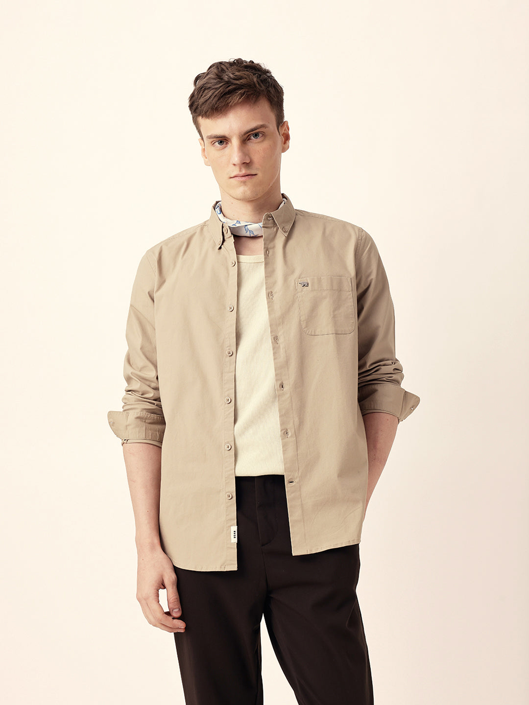 beige solid slim fit casual shirt with button down collar beige solid slim fit casual shirt with button down collar