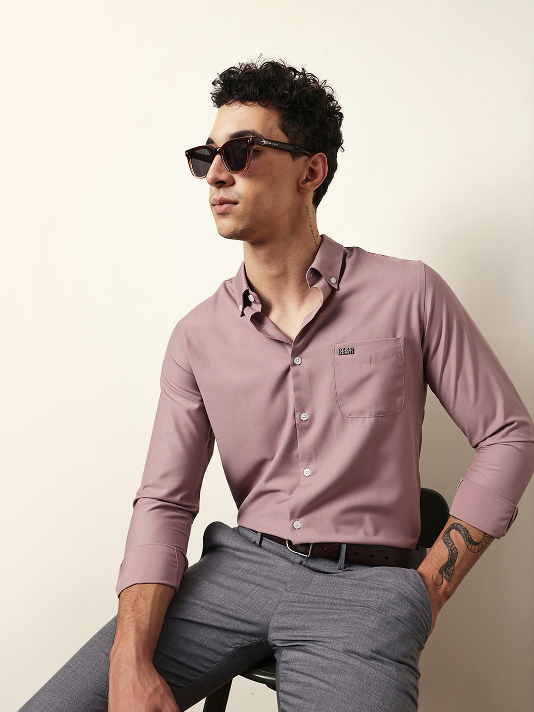 pink solid slim fit casual shirt with a classic semi formal look pink solid slim fit casual shirt with a classic semi formal look