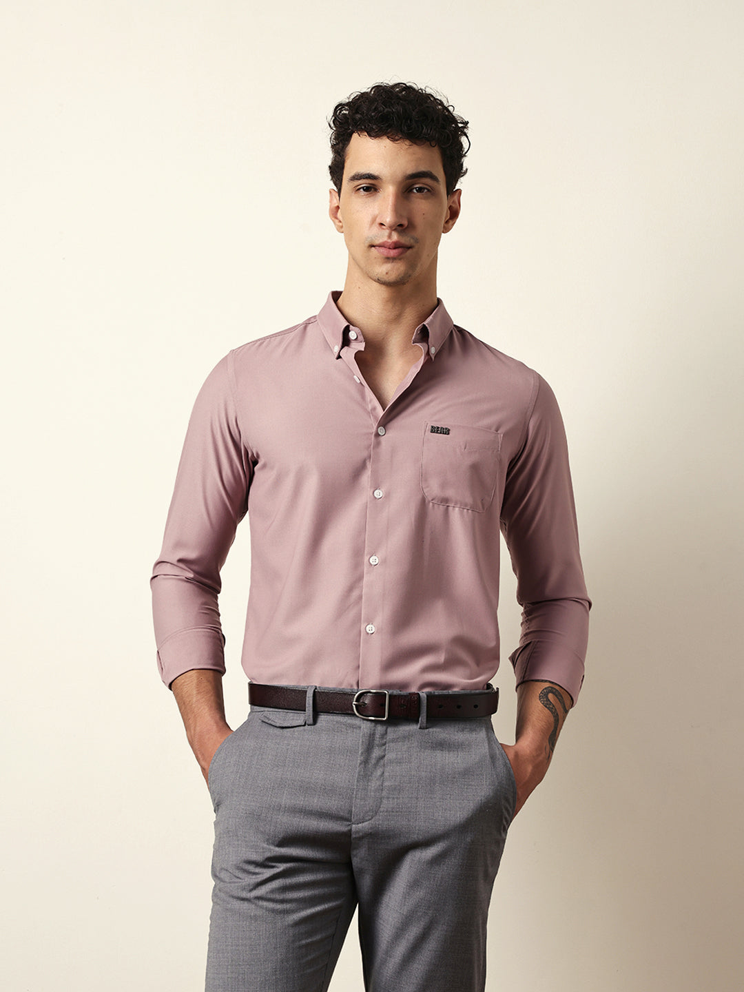 pink solid slim fit casual shirt with a classic semi formal look pink solid slim fit casual shirt with a classic semi formal look
