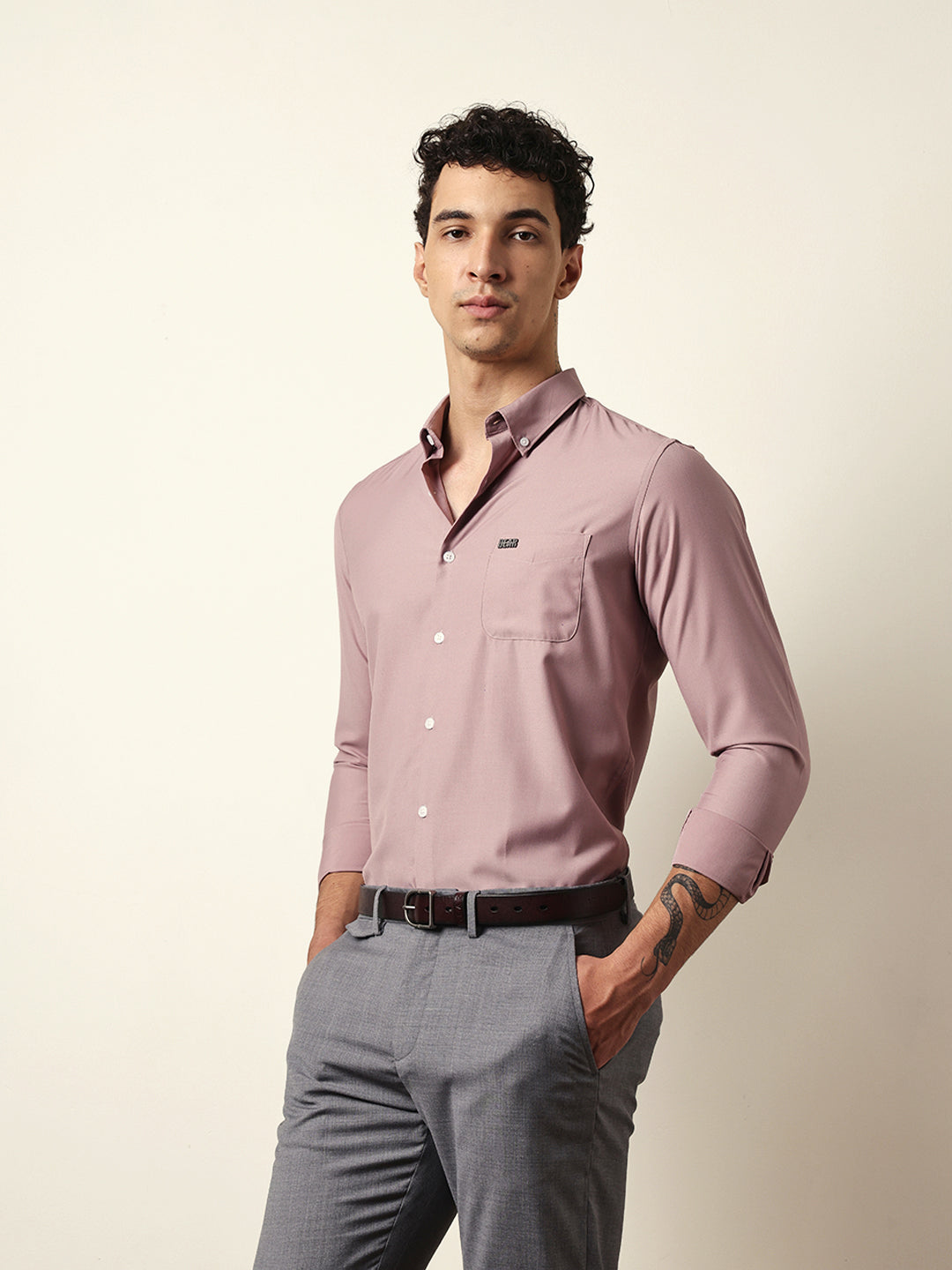 pink solid slim fit casual shirt with a classic semi formal look pink solid slim fit casual shirt with a classic semi formal look