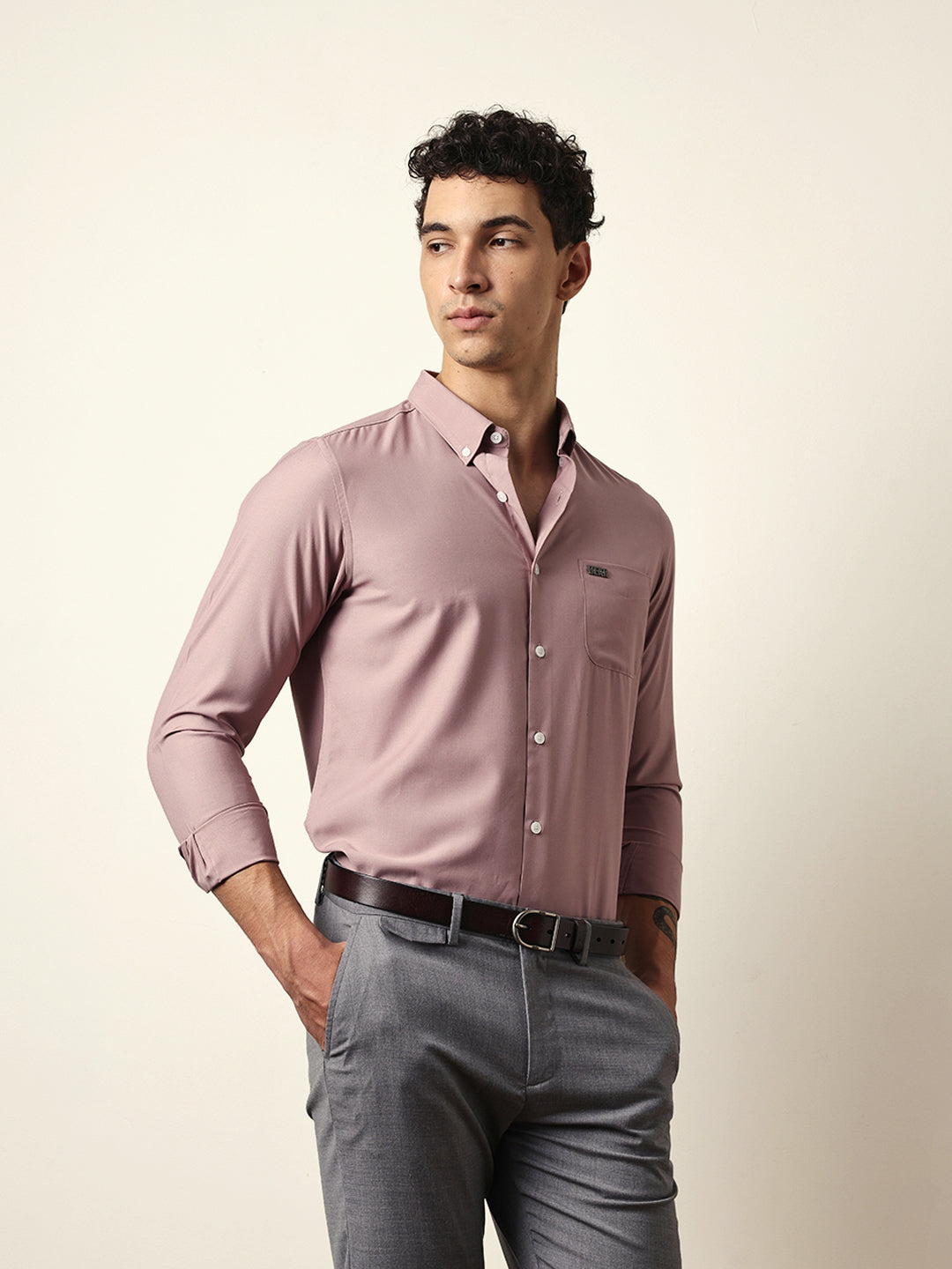 pink solid slim fit casual shirt with a classic semi formal look pink solid slim fit casual shirt with a classic semi formal look