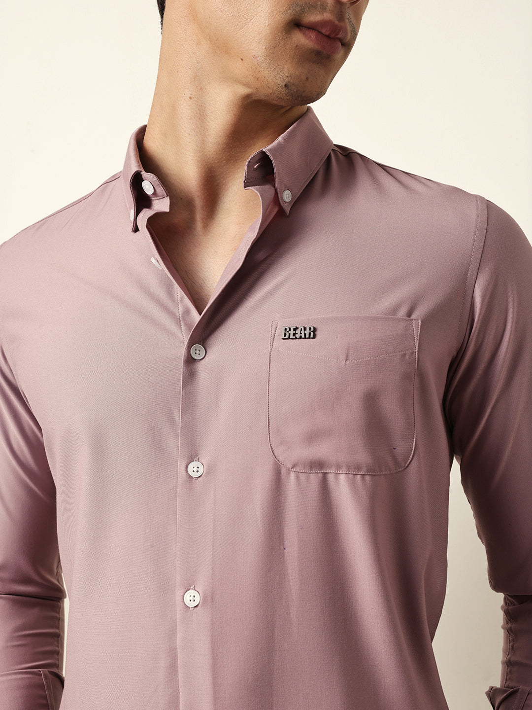 pink solid slim fit casual shirt with a classic semi formal look pink solid slim fit casual shirt with a classic semi formal look