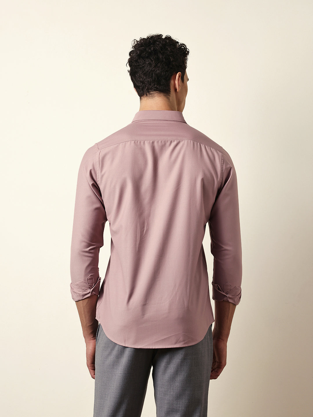 pink solid slim fit casual shirt with a classic semi formal look pink solid slim fit casual shirt with a classic semi formal look