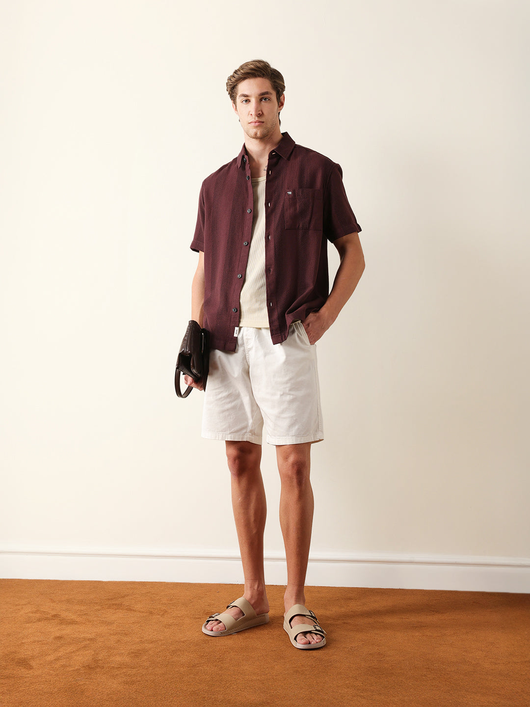 maroon relaxed fit casual half sleeve shirt with textured vertical stripes maroon relaxed fit casual half sleeve shirt with textured vertical stripes