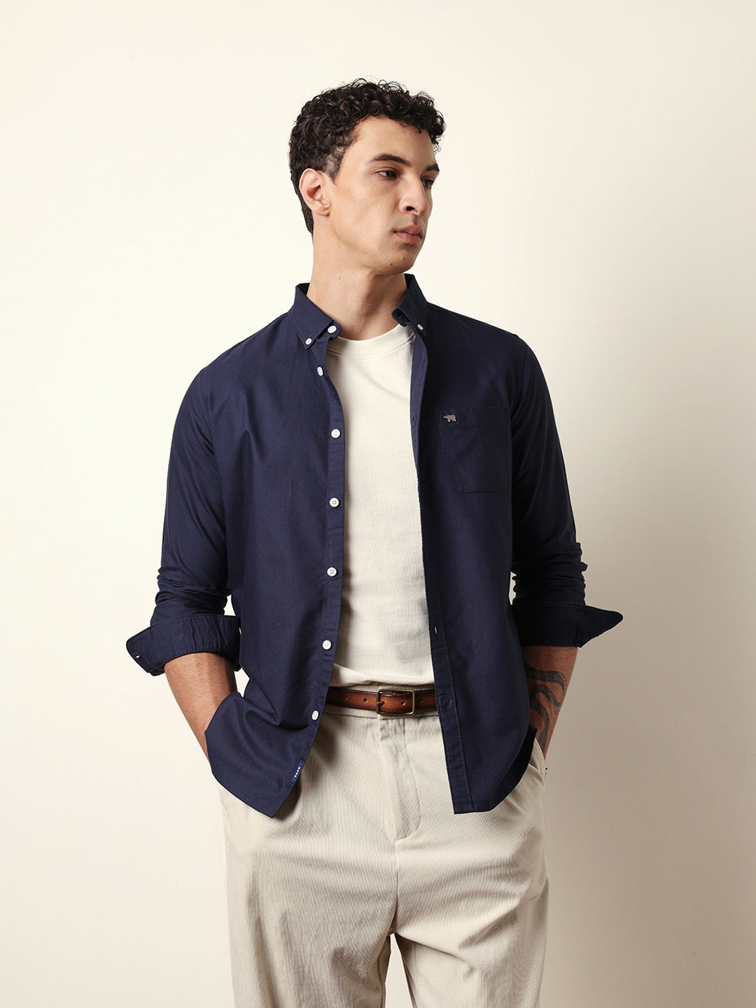 blue solid slim fit casual shirt with button down collar blue solid slim fit casual shirt with button down collar