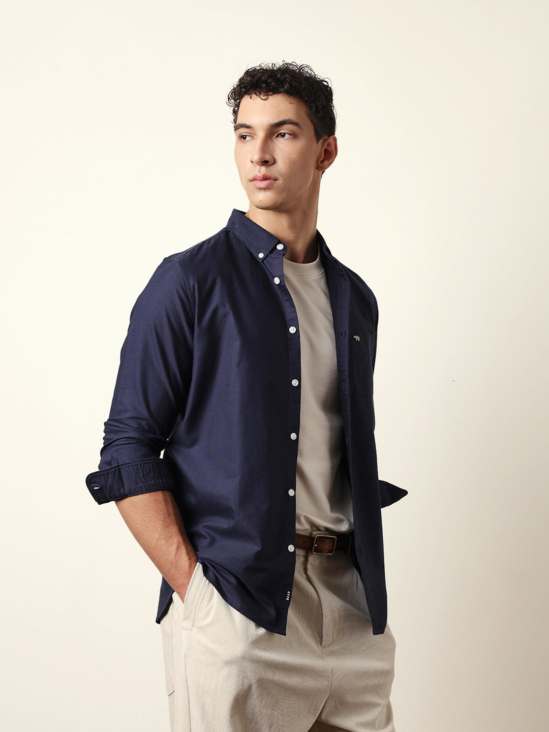 blue solid slim fit casual shirt with button down collar blue solid slim fit casual shirt with button down collar