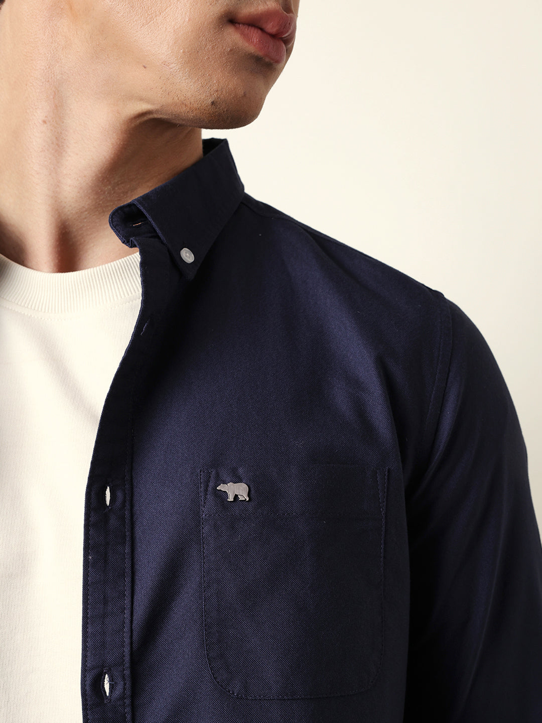blue solid slim fit casual shirt with button down collar blue solid slim fit casual shirt with button down collar