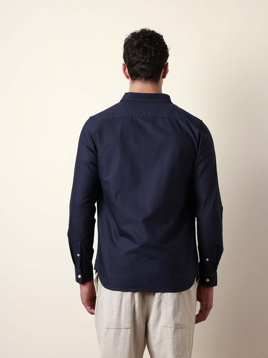 blue solid slim fit casual shirt with button down collar blue solid slim fit casual shirt with button down collar
