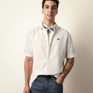 white all over textured leaf motif oversized shirt with half sleeves