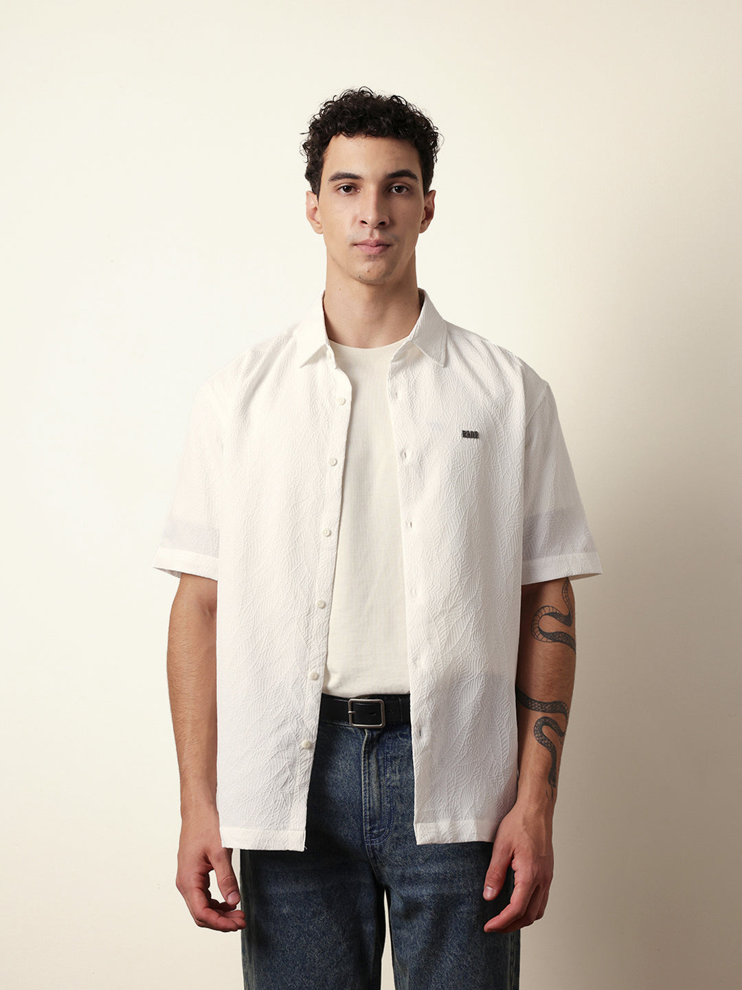 white all over textured leaf motif oversized shirt with half sleeves white all over textured leaf motif oversized shirt with half sleeves