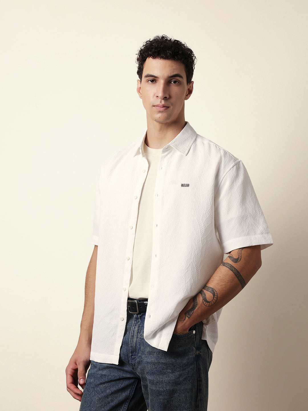 white all over textured leaf motif oversized shirt with half sleeves white all over textured leaf motif oversized shirt with half sleeves