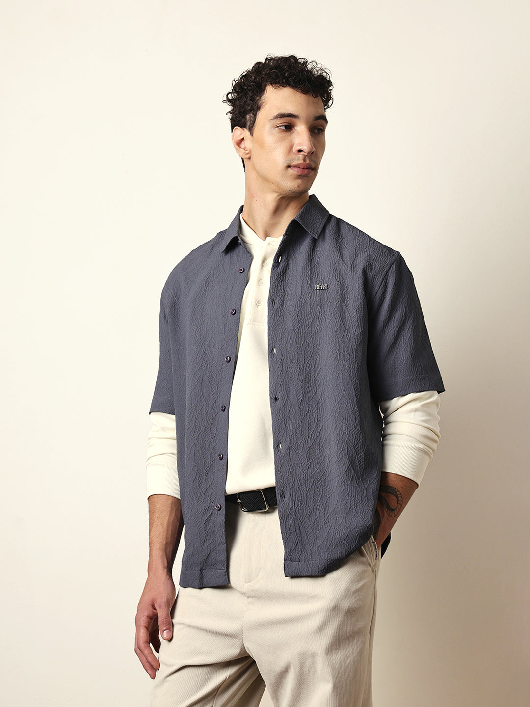 grey all over textured leaf motif oversized shirt with half sleeves grey all over textured leaf motif oversized shirt with half sleeves