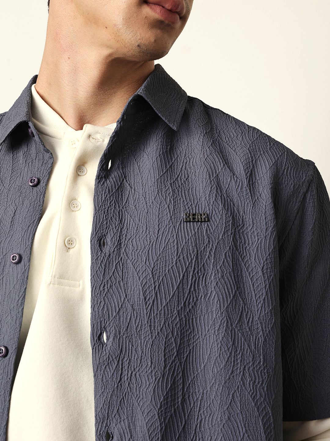 grey all over textured leaf motif oversized shirt with half sleeves grey all over textured leaf motif oversized shirt with half sleeves